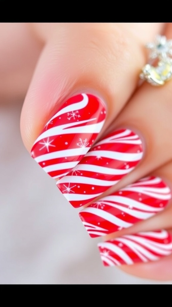 Candy Cane Inspired Red Christmas Nail Art Close-up of red Christmas nails with candy cane stripes on a snowy background.